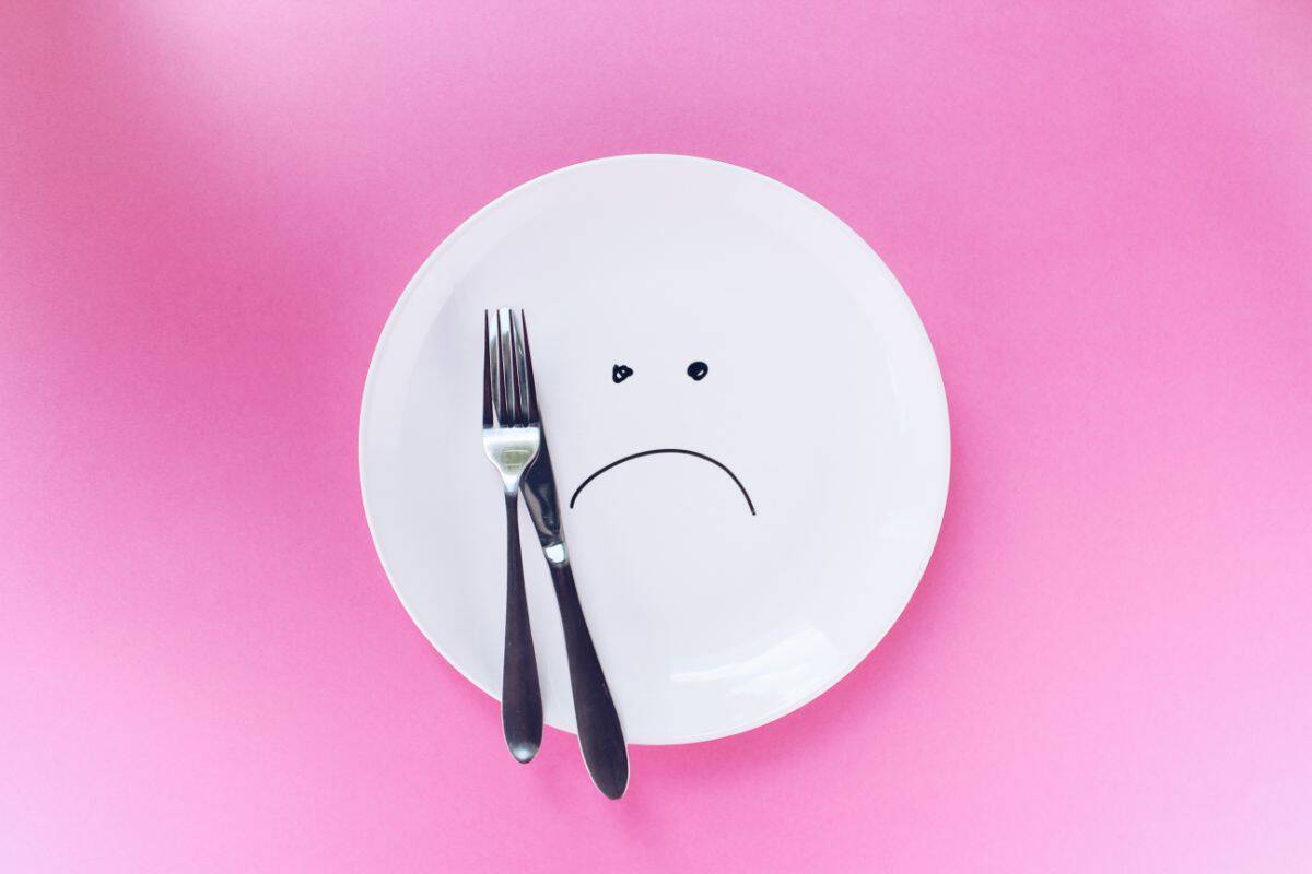 To eat or not to eat - sad face on plate